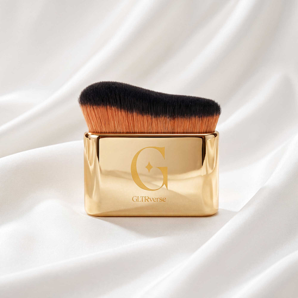 GLTRverse gold-cased shimmer oil applicator brush on cream silk